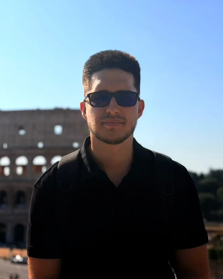 Alexandru Popa in front of the Colosseum in Rome